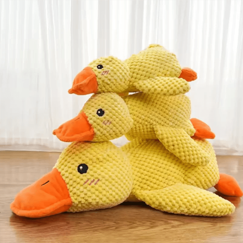 Dog sleeping with a dog hug duck toys to relieve boredom of little yellow duck pet interactive plush doll pet supplies - Happy Tails